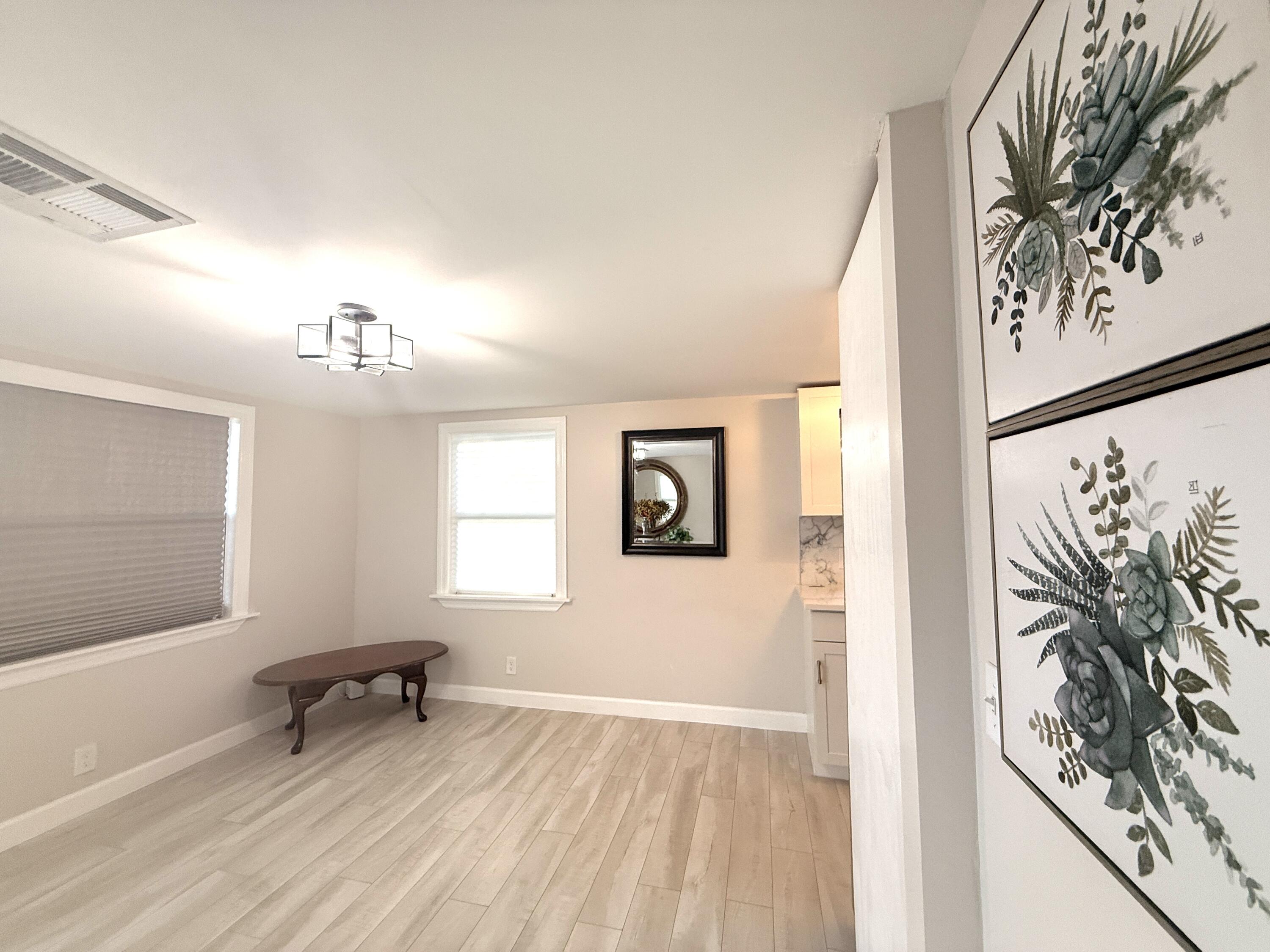 1093 Highview Road Lantana, FL 33462 - Photo 17 of 34 a view of livingroom with furniture and window