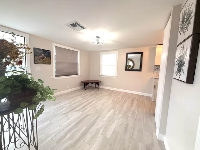 a view of livingroom with furniture and window