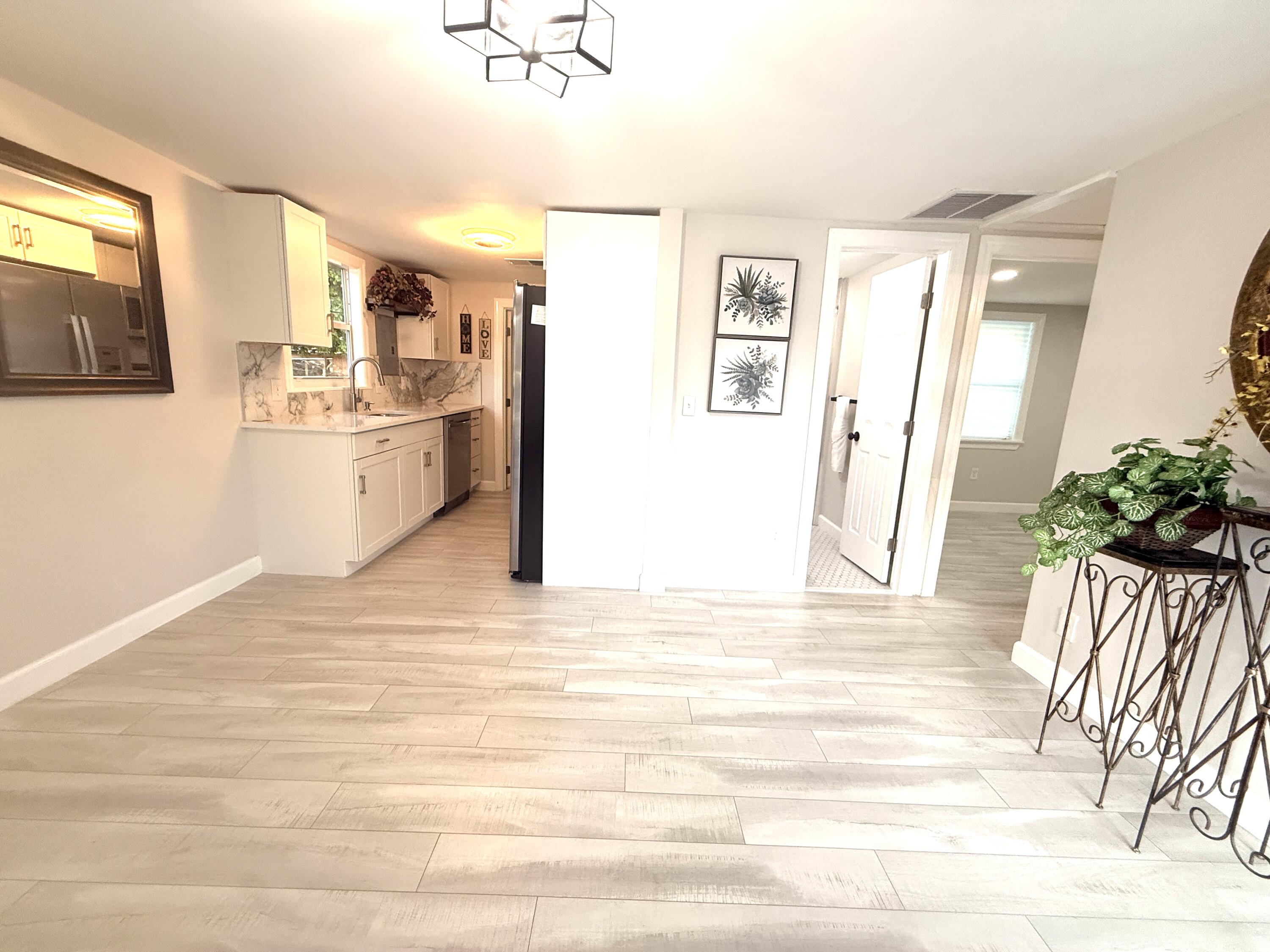 1093 Highview Road Lantana, FL 33462 - Photo 26 of 34 a view of a kitchen and an empty room