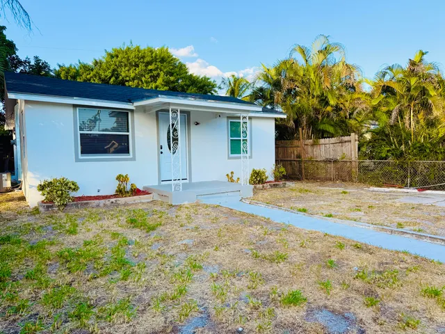 a house view with a garden space