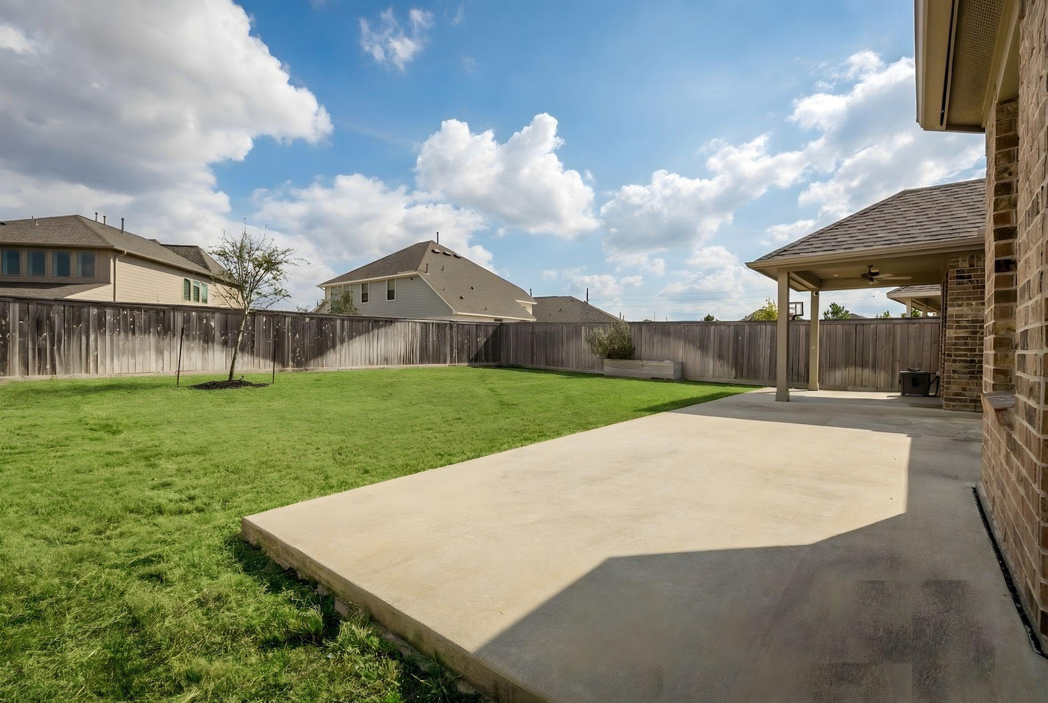 14914 Big Bend Ranch Drive Cypress, TX 77433 - Photo 42 of 49 a view of a house with backyard and a garden