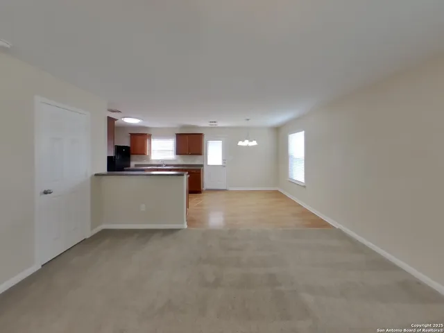 a view of a kitchen with a sink cabinets and window