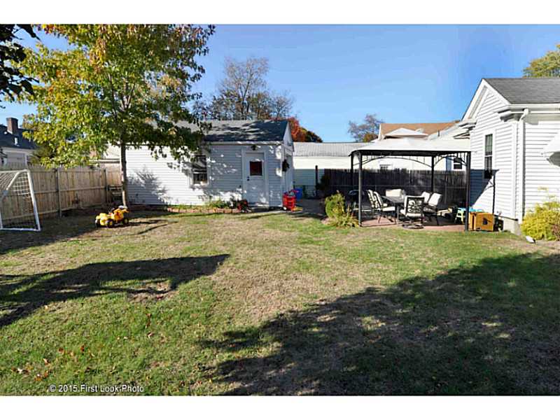 34 Rice Street Pawtucket, RI 02861 - Photo 25 of 25 Yard/Garden. Spacious fenced yard with stone patio