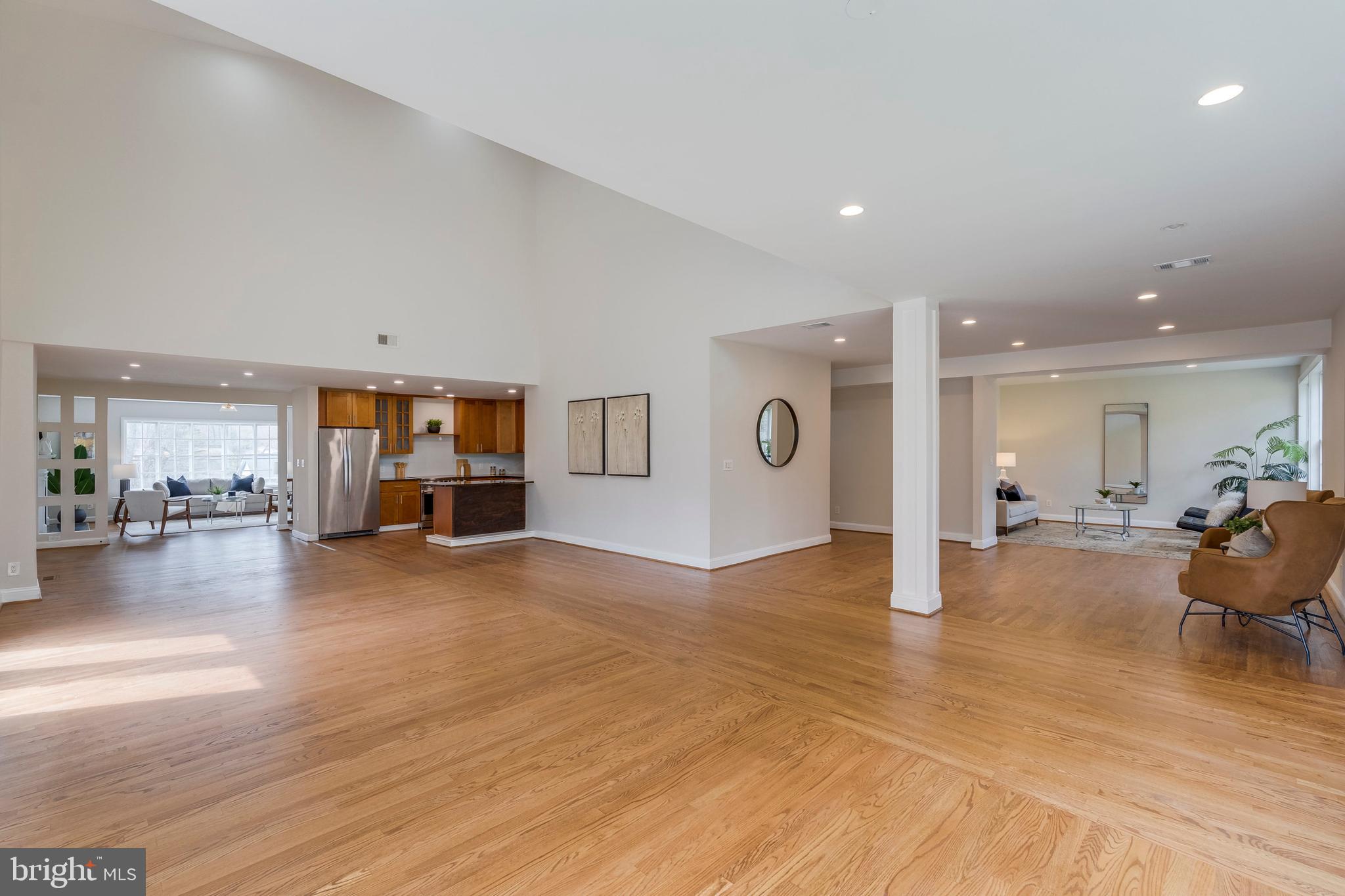 15001 Peach Orchard Road Silver Spring, MD 20905 - Photo 17 of 63 a view of a livingroom with furniture wooden floor and windows