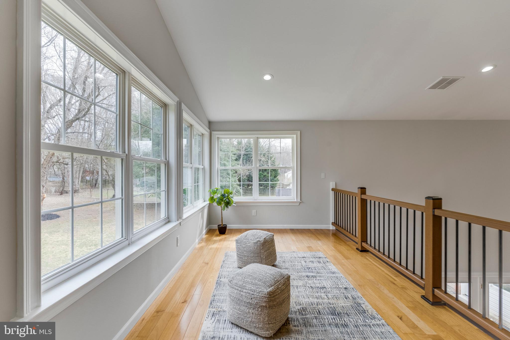 15001 Peach Orchard Road Silver Spring, MD 20905 - Photo 29 of 63 a living room with furniture and a large window