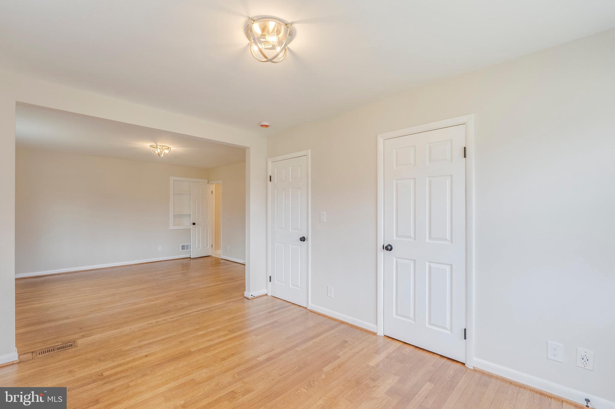 15001 Peach Orchard Road Silver Spring, MD 20905 - Photo 32 of 63 wooden floor in an empty room