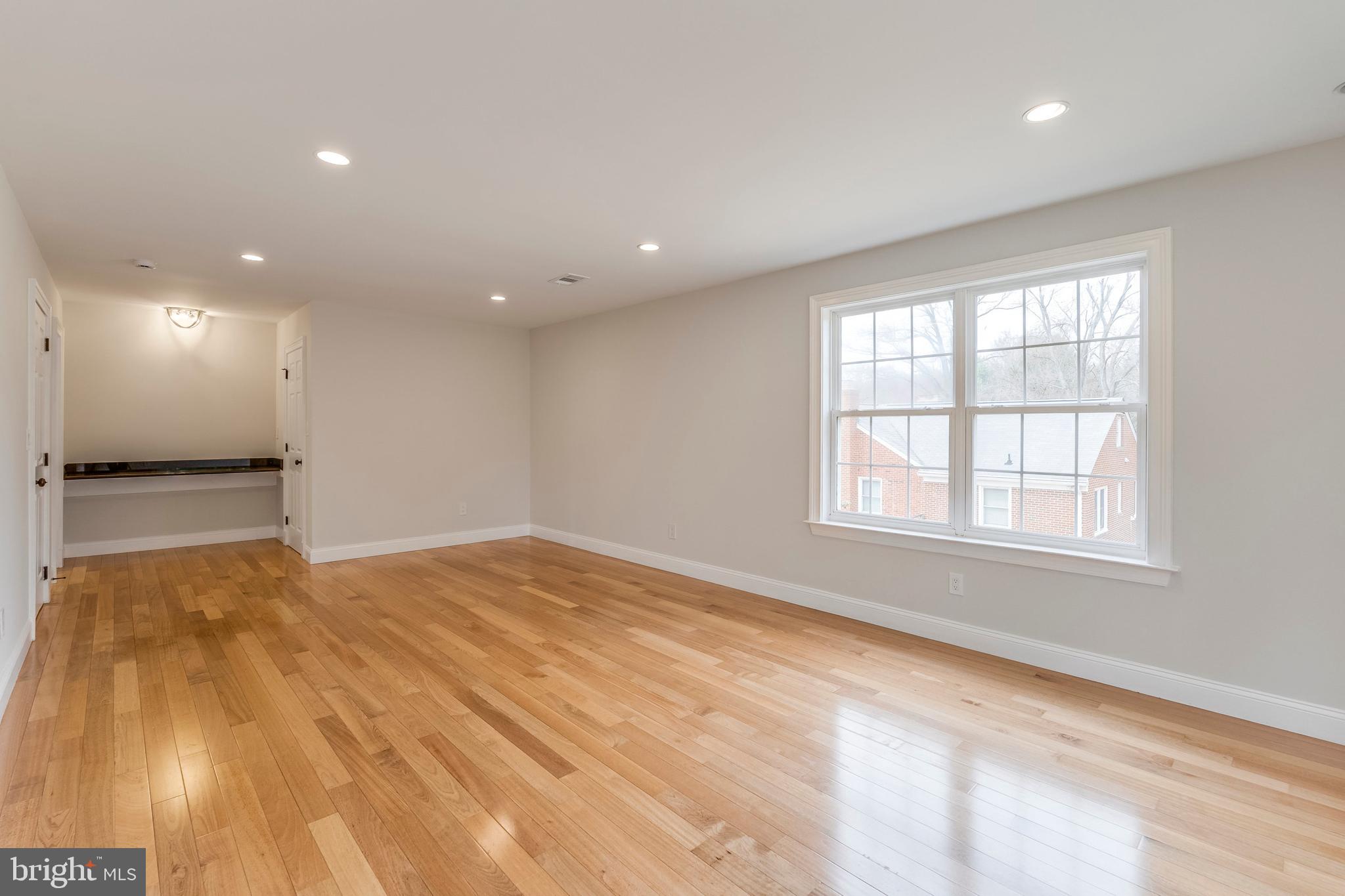 15001 Peach Orchard Road Silver Spring, MD 20905 - Photo 48 of 63 a view of an empty room with a window