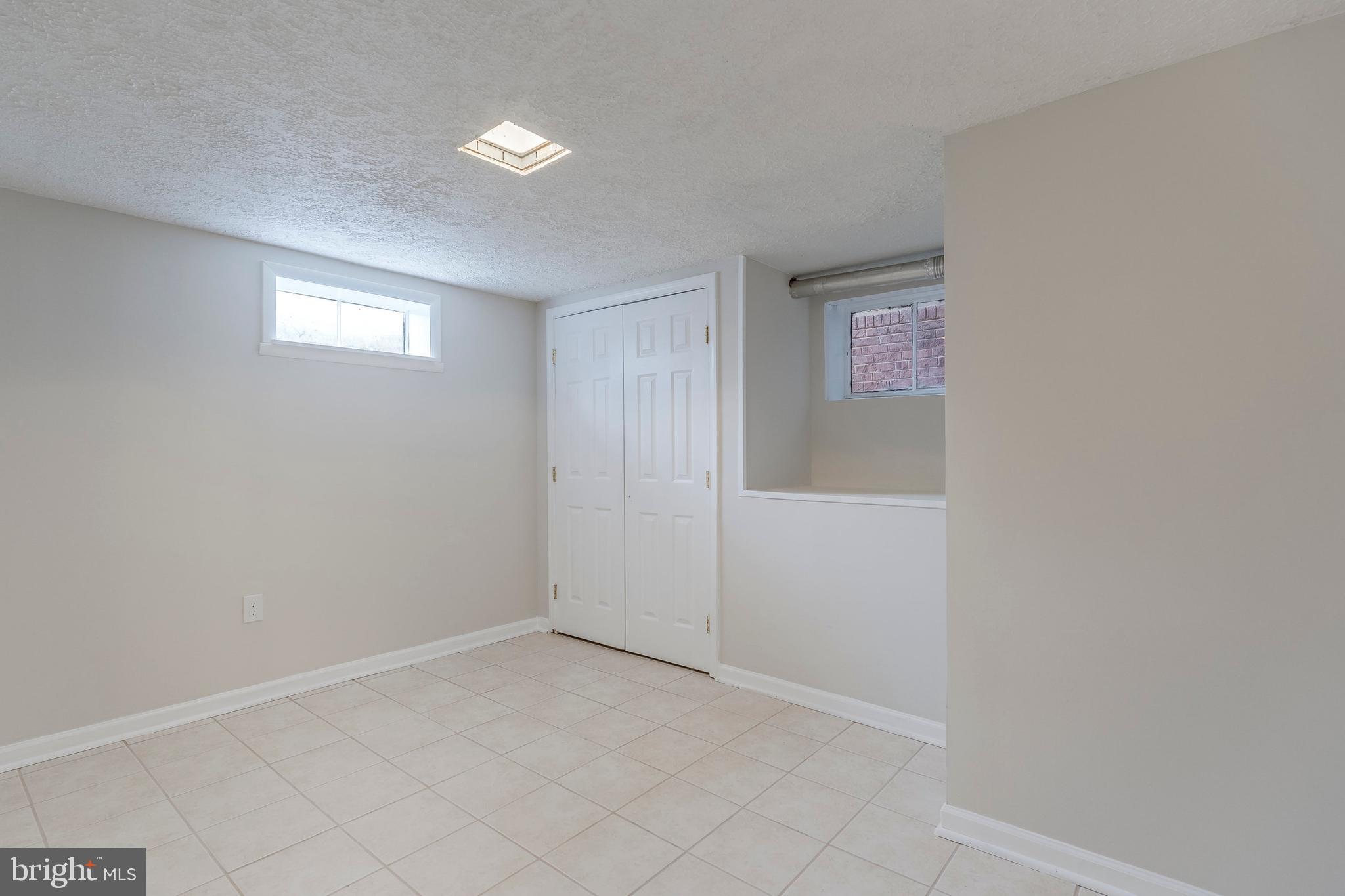 15001 Peach Orchard Road Silver Spring, MD 20905 - Photo 55 of 63 a view of an empty room