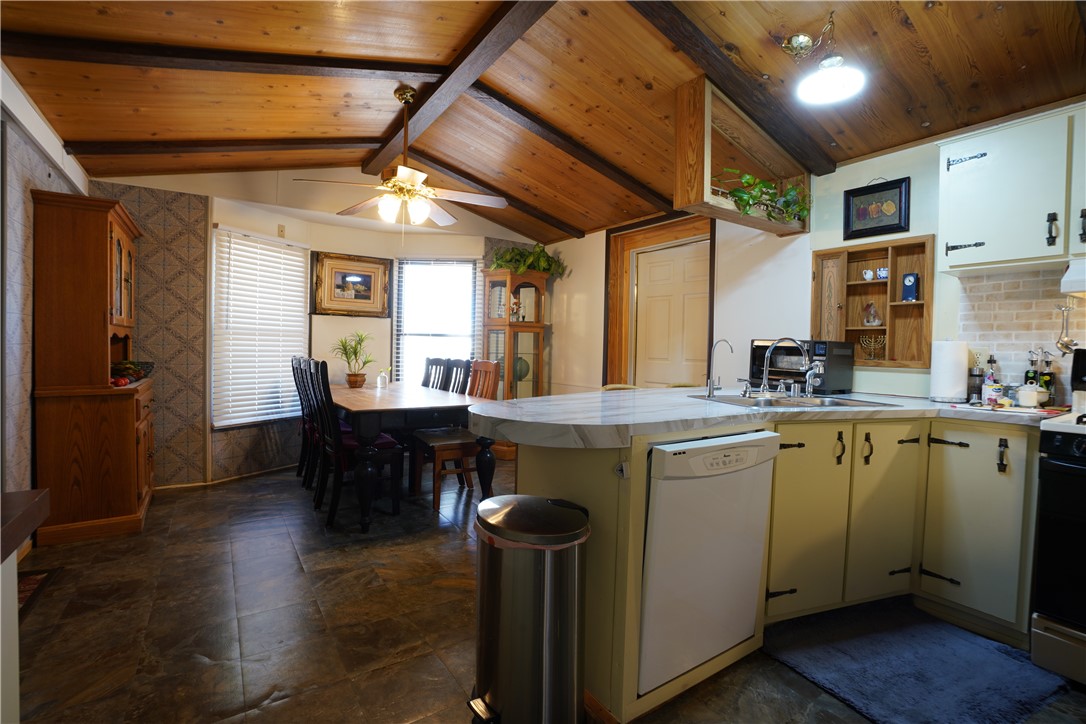 18193 Sequoia Drive Dolan Springs, AZ 86441 - Photo 10 of 50 a kitchen with a table and chairs
