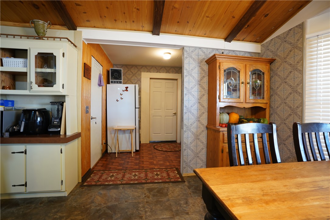18193 Sequoia Drive Dolan Springs, AZ 86441 - Photo 11 of 50 a view of a hallway with wooden floor and a fireplace