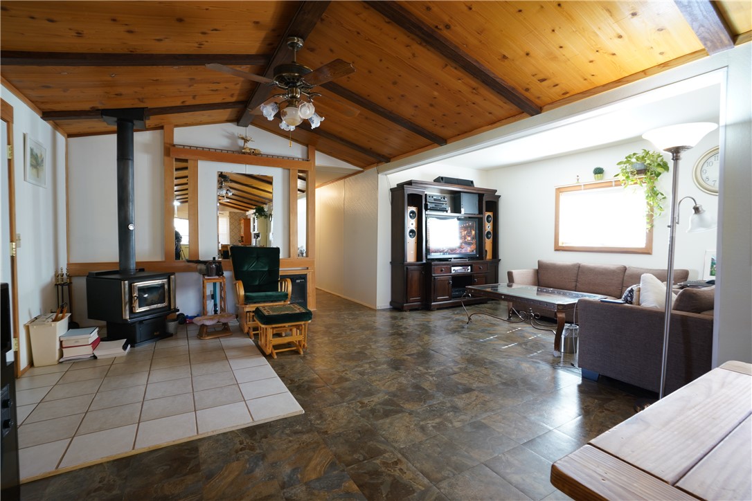18193 Sequoia Drive Dolan Springs, AZ 86441 - Photo 14 of 50 a living room with furniture rug and window