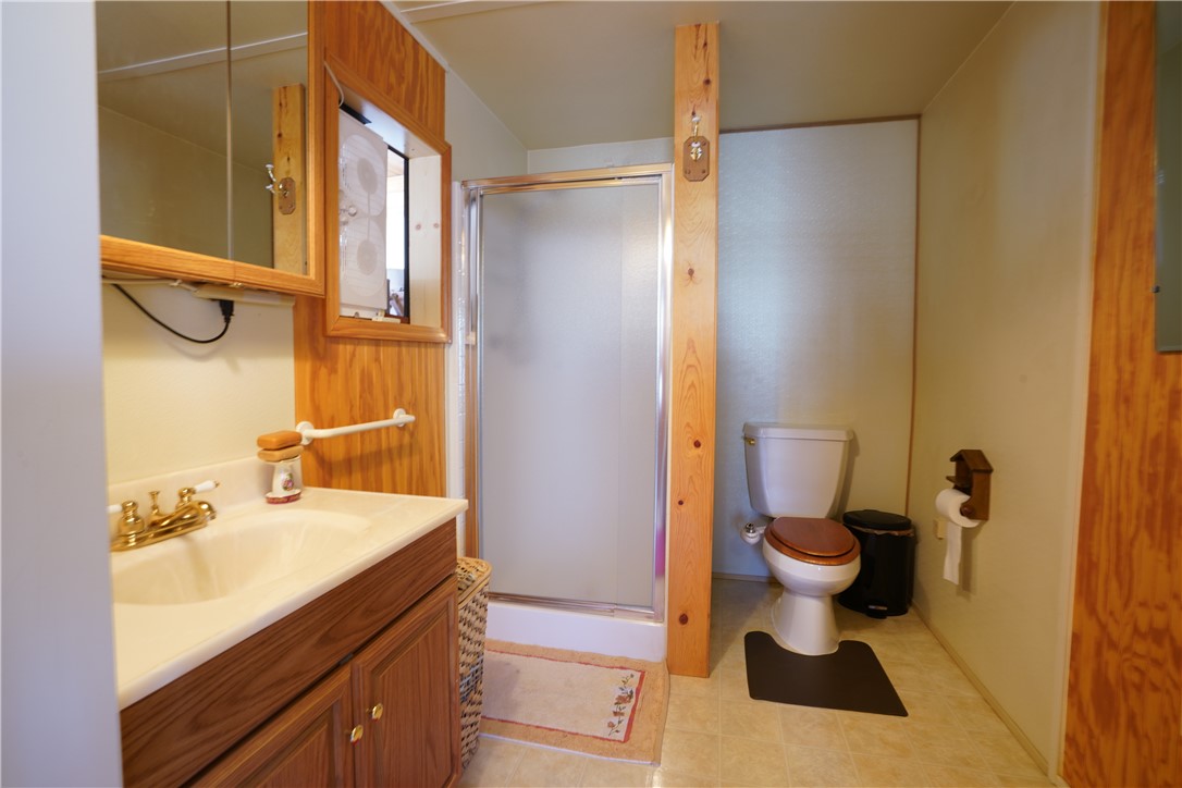18193 Sequoia Drive Dolan Springs, AZ 86441 - Photo 28 of 50 a bathroom with a sink and a mirror