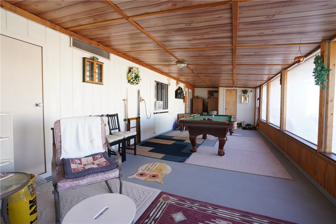 18193 Sequoia Drive Dolan Springs, AZ 86441 - Photo 32 of 50 a living room with furniture and wooden floor
