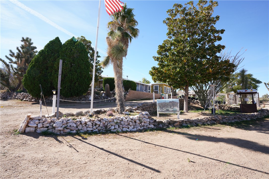 18193 Sequoia Drive Dolan Springs, AZ 86441 - Photo 43 of 50 a backyard of a house with lots of green space