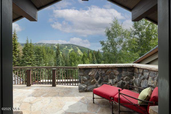 780 Potato Patch Drive Vail, CO 81657 - Photo 15 of 26 a view of chair and tables in the balcony