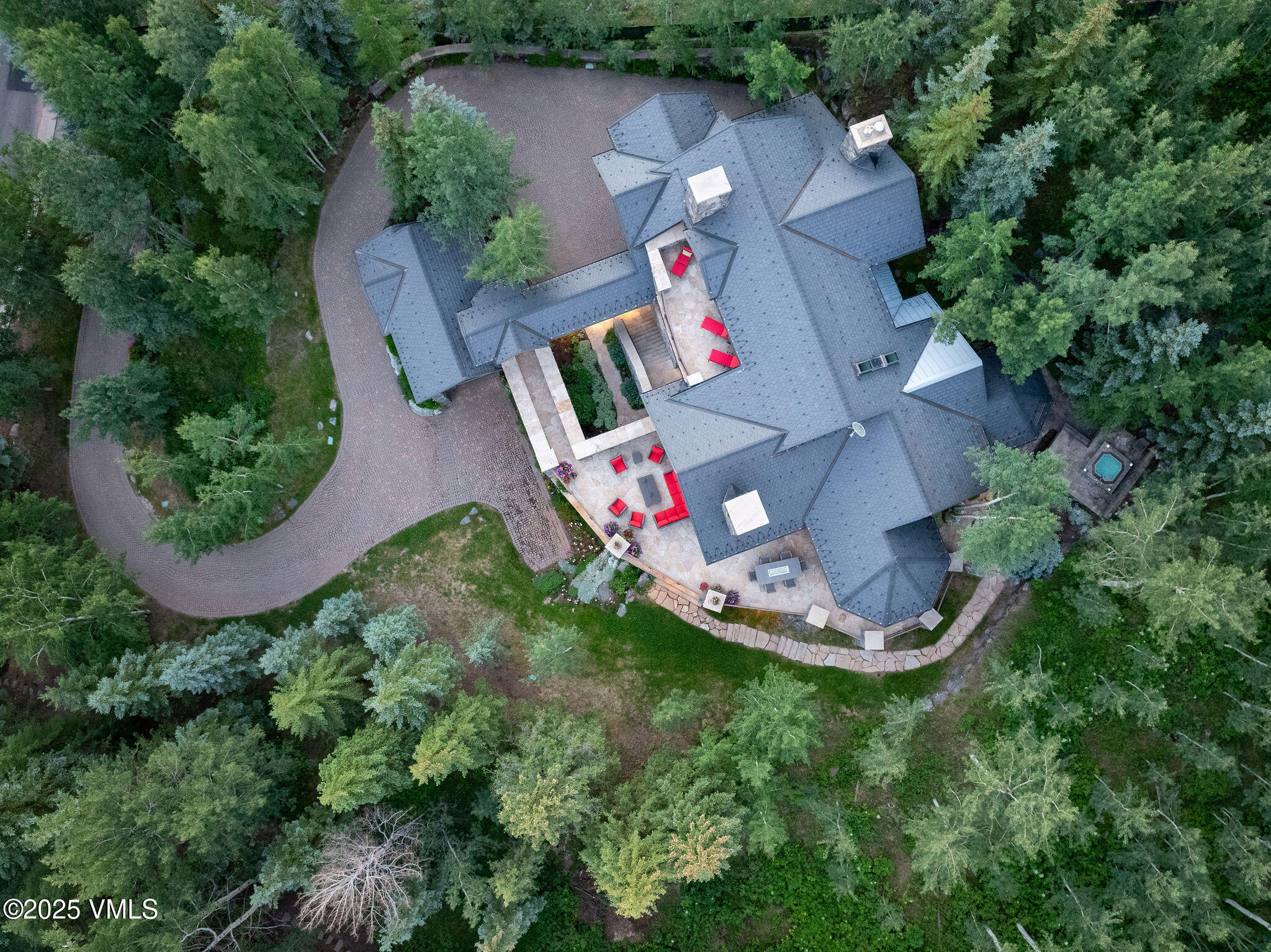 780 Potato Patch Drive Vail, CO 81657 - Photo 21 of 26 an aerial view of residential house with outdoor space and trees all around