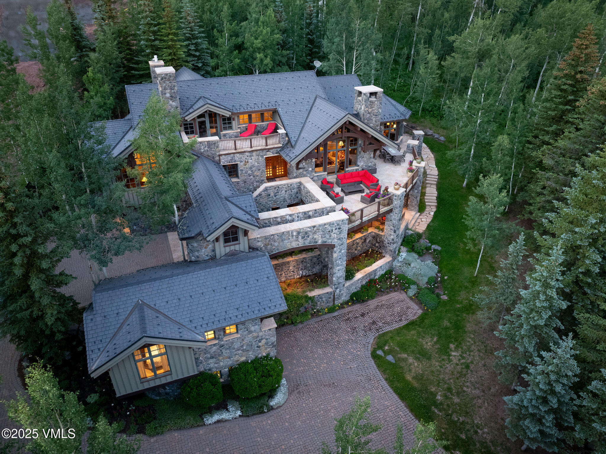 780 Potato Patch Drive Vail, CO 81657 - Photo 24 of 26 an aerial view of a house with a yard and large trees