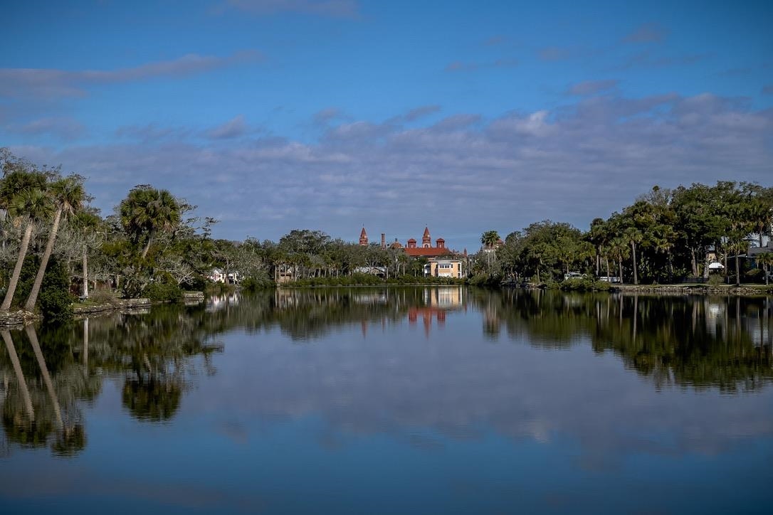 131 Washington Street St. Augustine, FL 32084 - Photo 32 of 33 a view of a lake with houses in the back