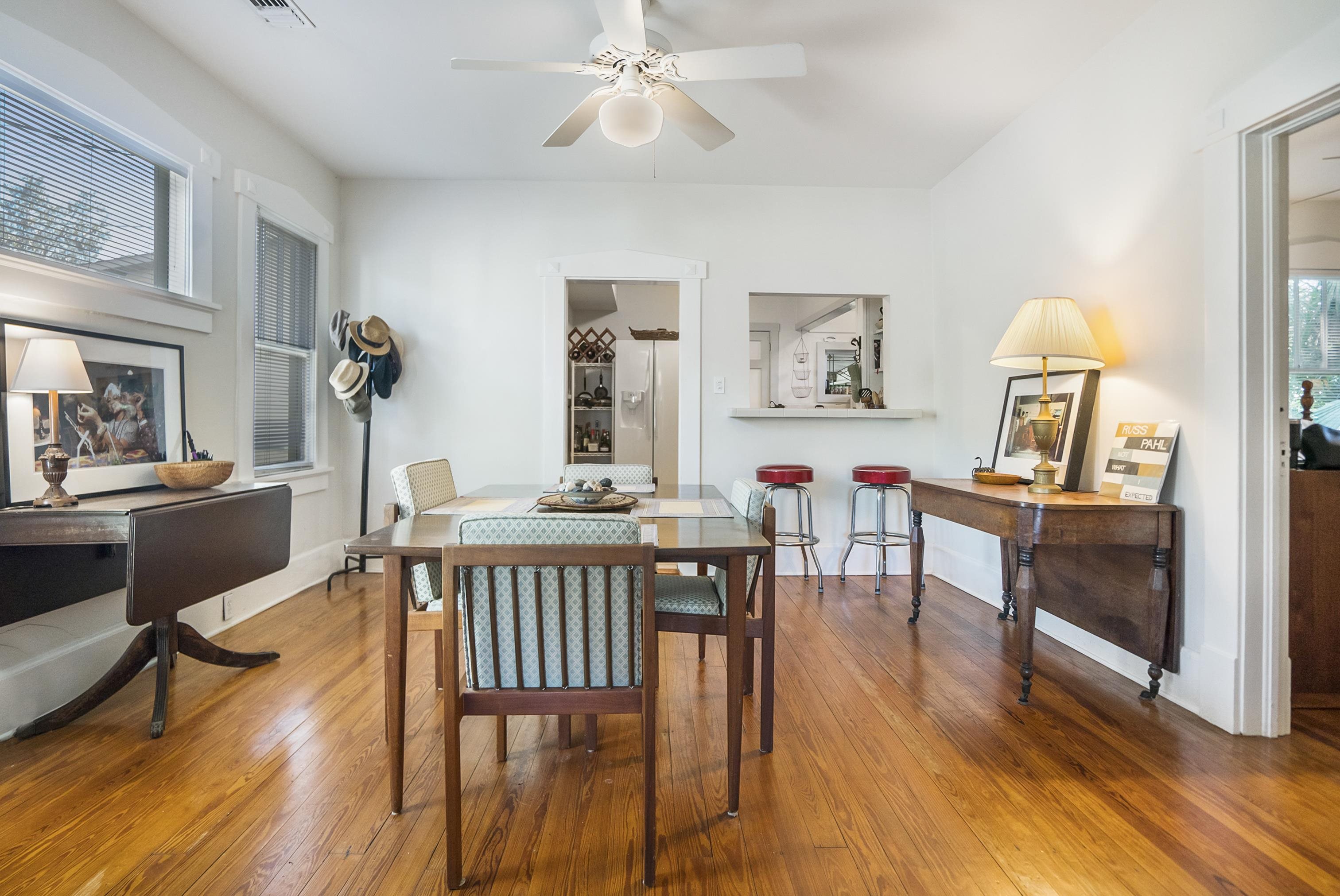 131 Washington Street St. Augustine, FL 32084 - Photo 10 of 33 a view of a dining room with furniture and wooden floor
