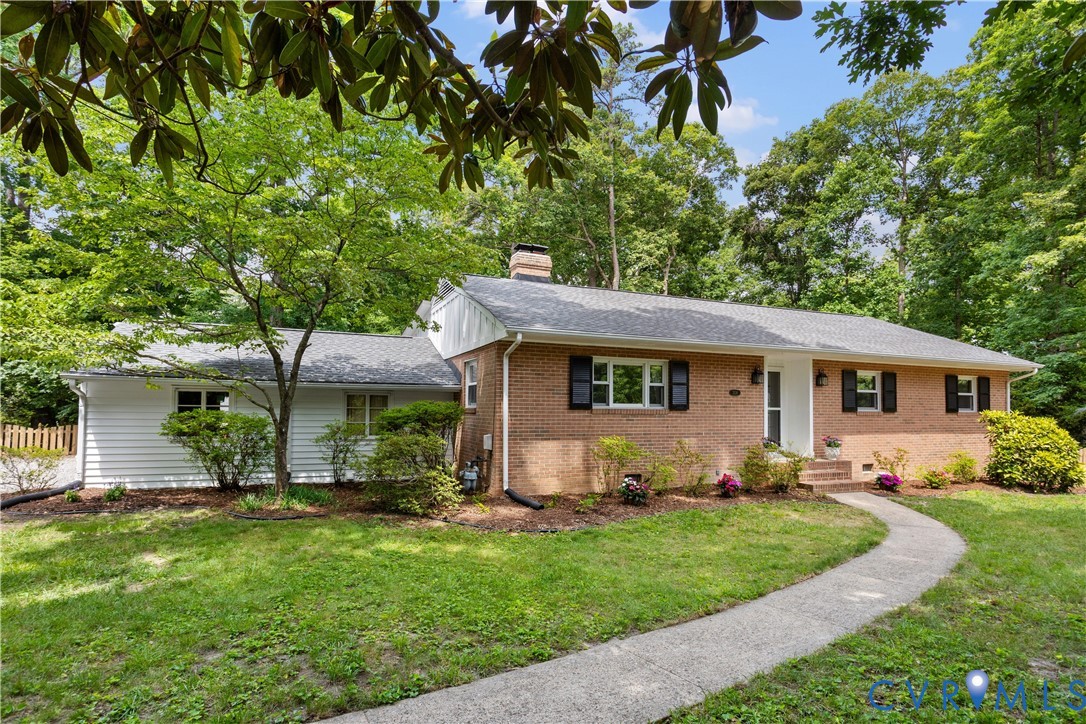 3136 Old Quarry Road Richmond, VA 23225 - Photo 2 of 39 Brick and white siding exterior with a dark shingl