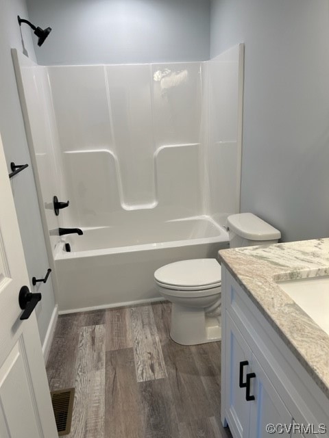 10234 Doyle Boulevard McKenney, VA 23872 - Photo 8 of 10 a bathroom with a granite countertop sink toilet and shower