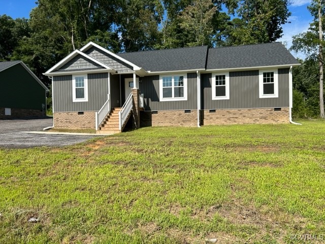 10234 Doyle Boulevard McKenney, VA 23872 - Photo 10 of 10 a front view of a house with a yard