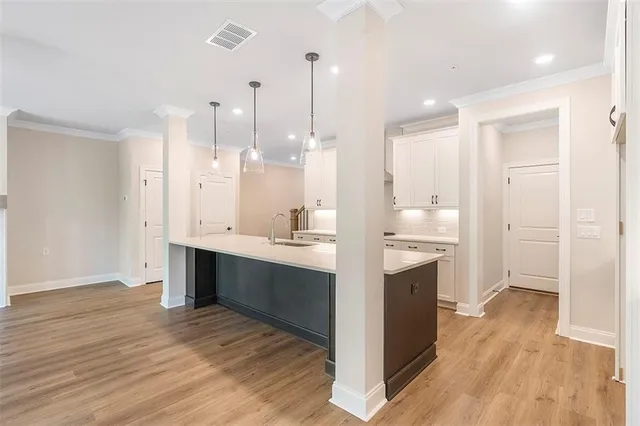 a large kitchen with a lot of counter space and appliances