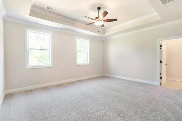 a view of a livingroom with a ceiling fan