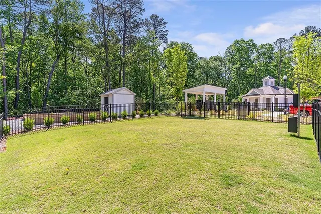 a view of swimming pool with lounge chair