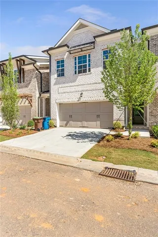 a house with trees in front of it
