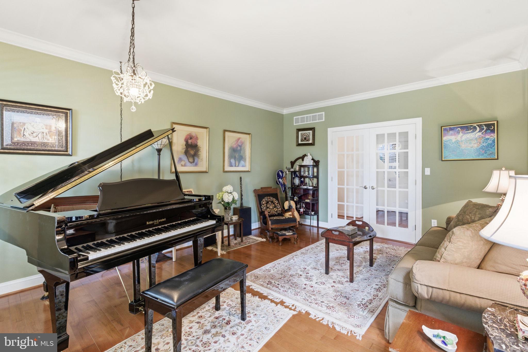 9 Deer Ridge Court Phoenix, MD 21131 - Photo 15 of 96 a living room with furniture and a piano