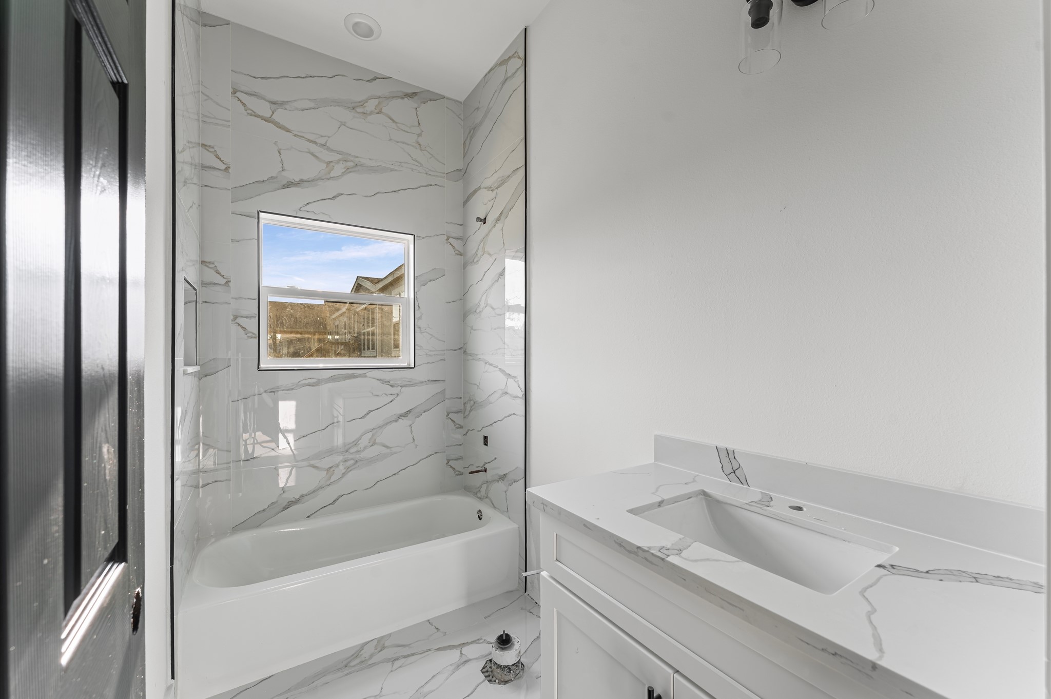 1110 Longleaf Pne Street Huffman, TX 77336 - Photo 12 of 15 Stylish second bathroom with modern finishes Photos are representative of the same floor plan built by this builder. Finishes will be the same or similar