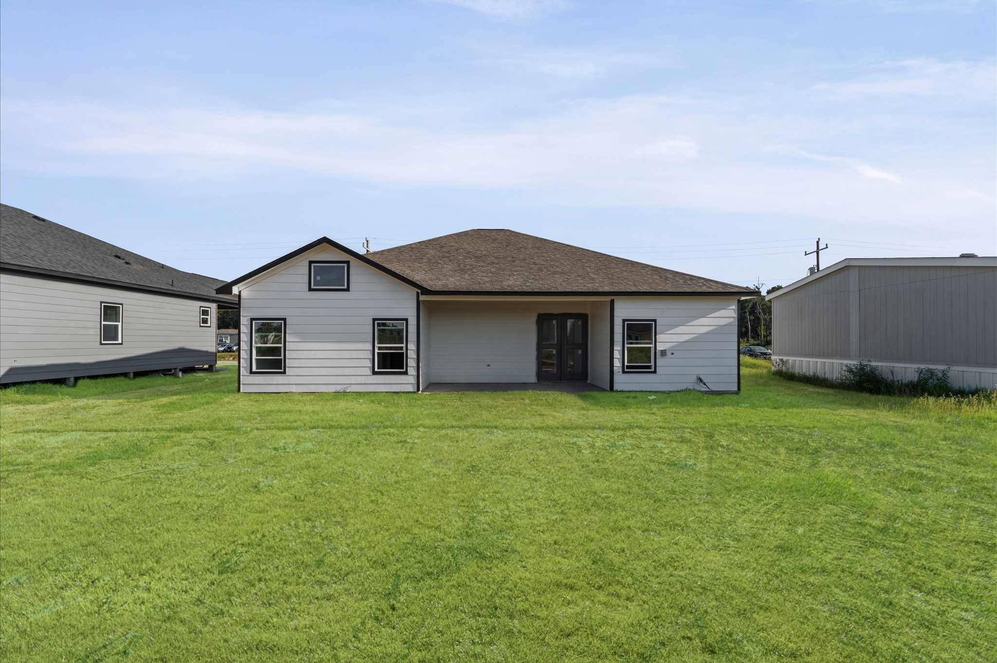 1110 Longleaf Pne Street Huffman, TX 77336 - Photo 15 of 15 Generous lot offering plenty of space for play, gardening, or future projects—no HOA and low tax rate. Photos are representative of the same floor plan built by this builder. Finishes will be the same or similar.