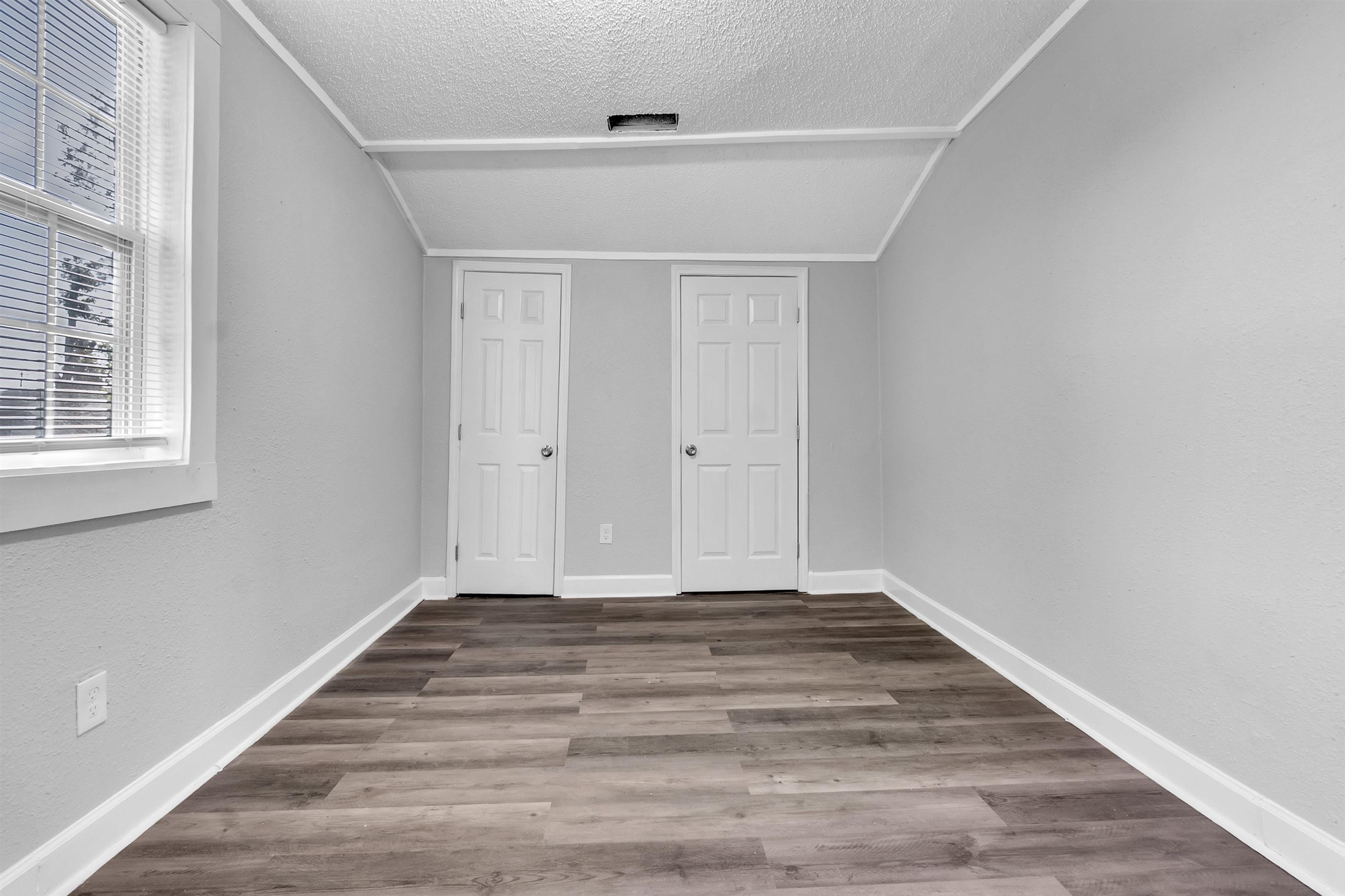 2442 Manchester Road Memphis, TN 38114 - Photo 14 of 22 a view of a room with wooden floor