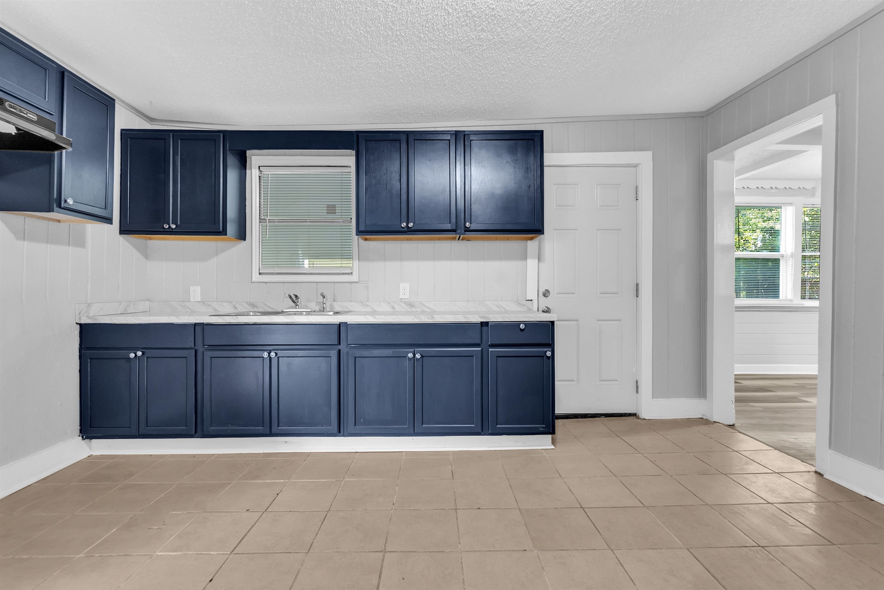 2442 Manchester Road Memphis, TN 38114 - Photo 15 of 22 a bathroom with a granite countertop sink and a vanity