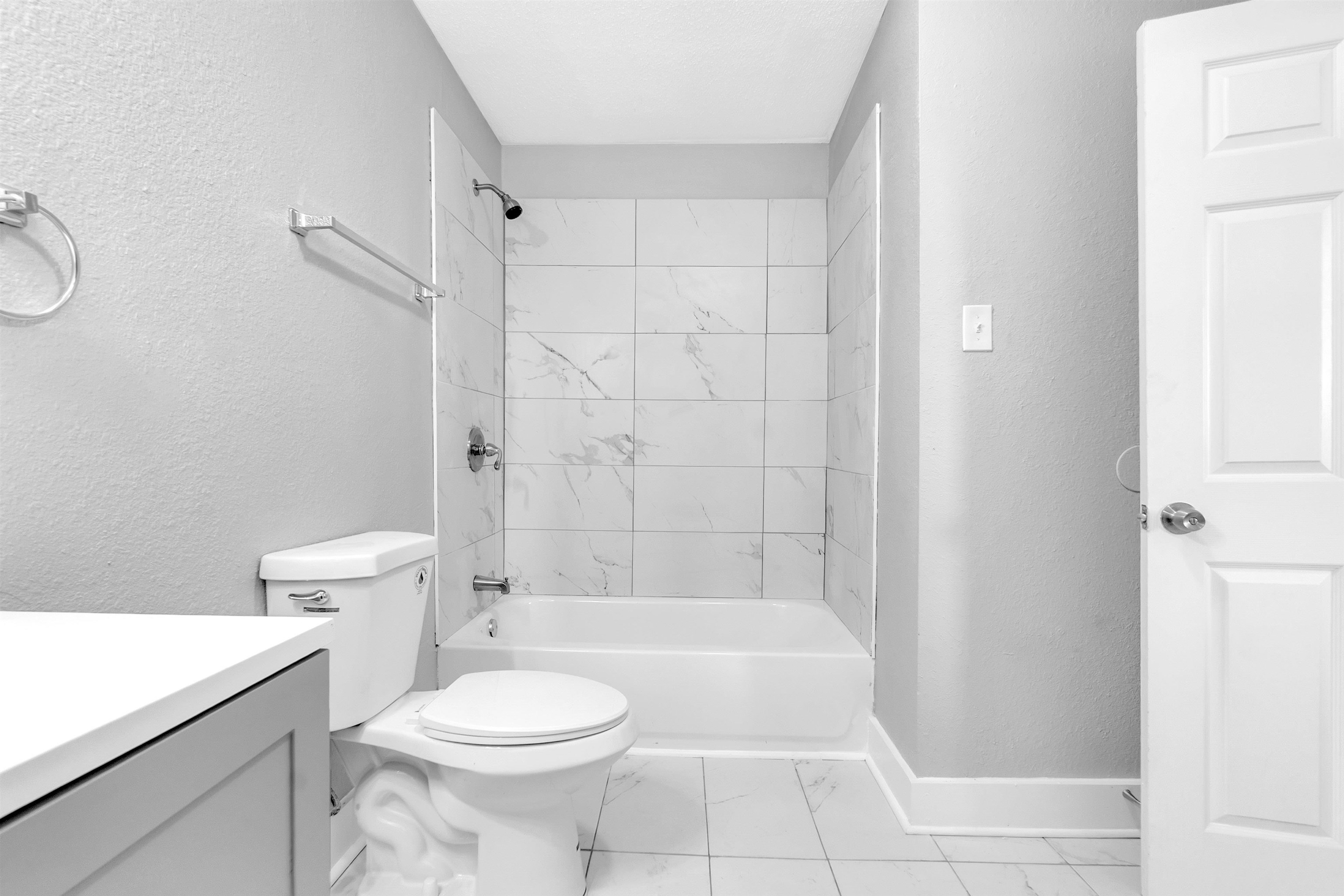 2442 Manchester Road Memphis, TN 38114 - Photo 19 of 22 a bathroom with a toilet sink and shower