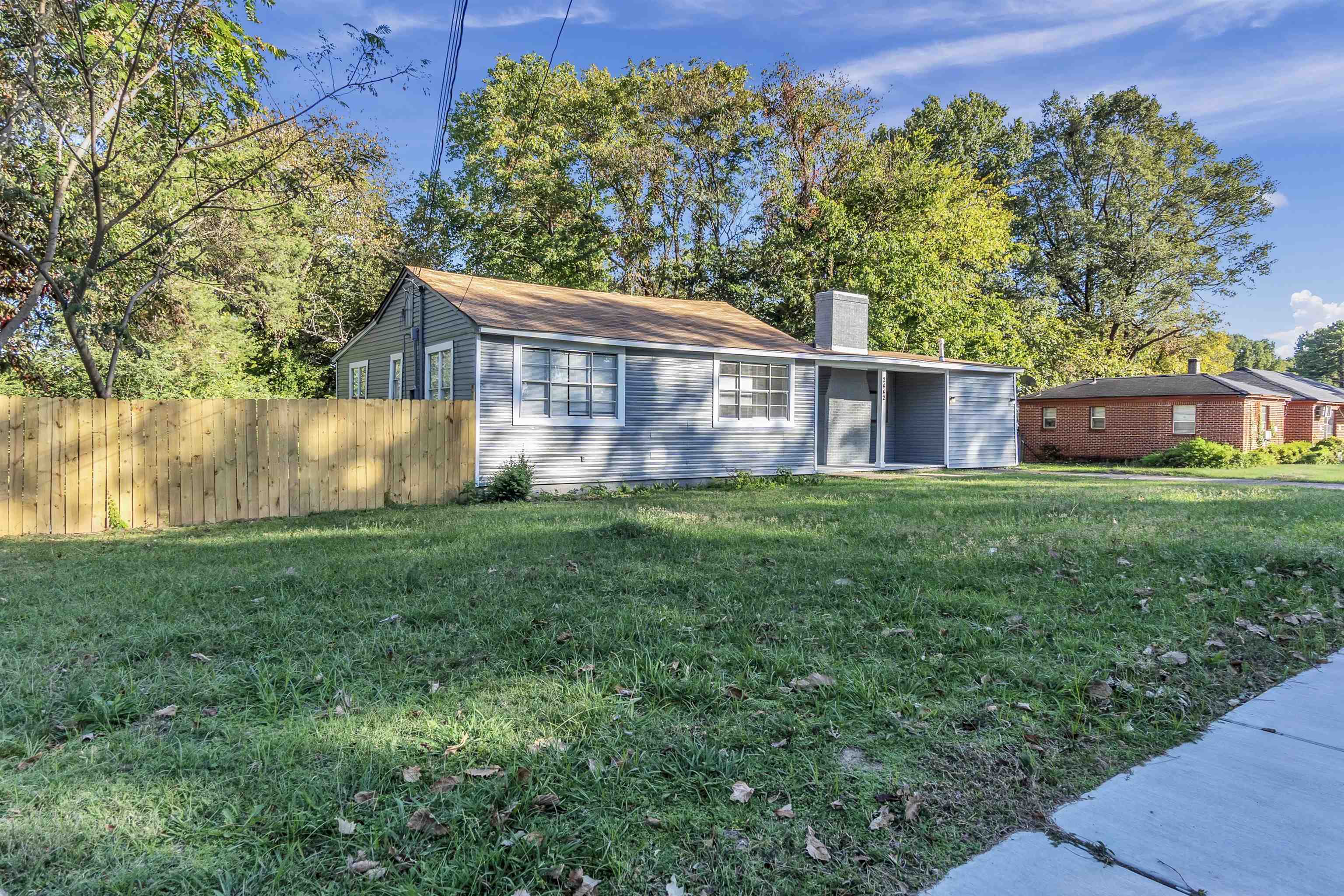 2442 Manchester Road Memphis, TN 38114 - Photo 3 of 22 front view of a house with a yard