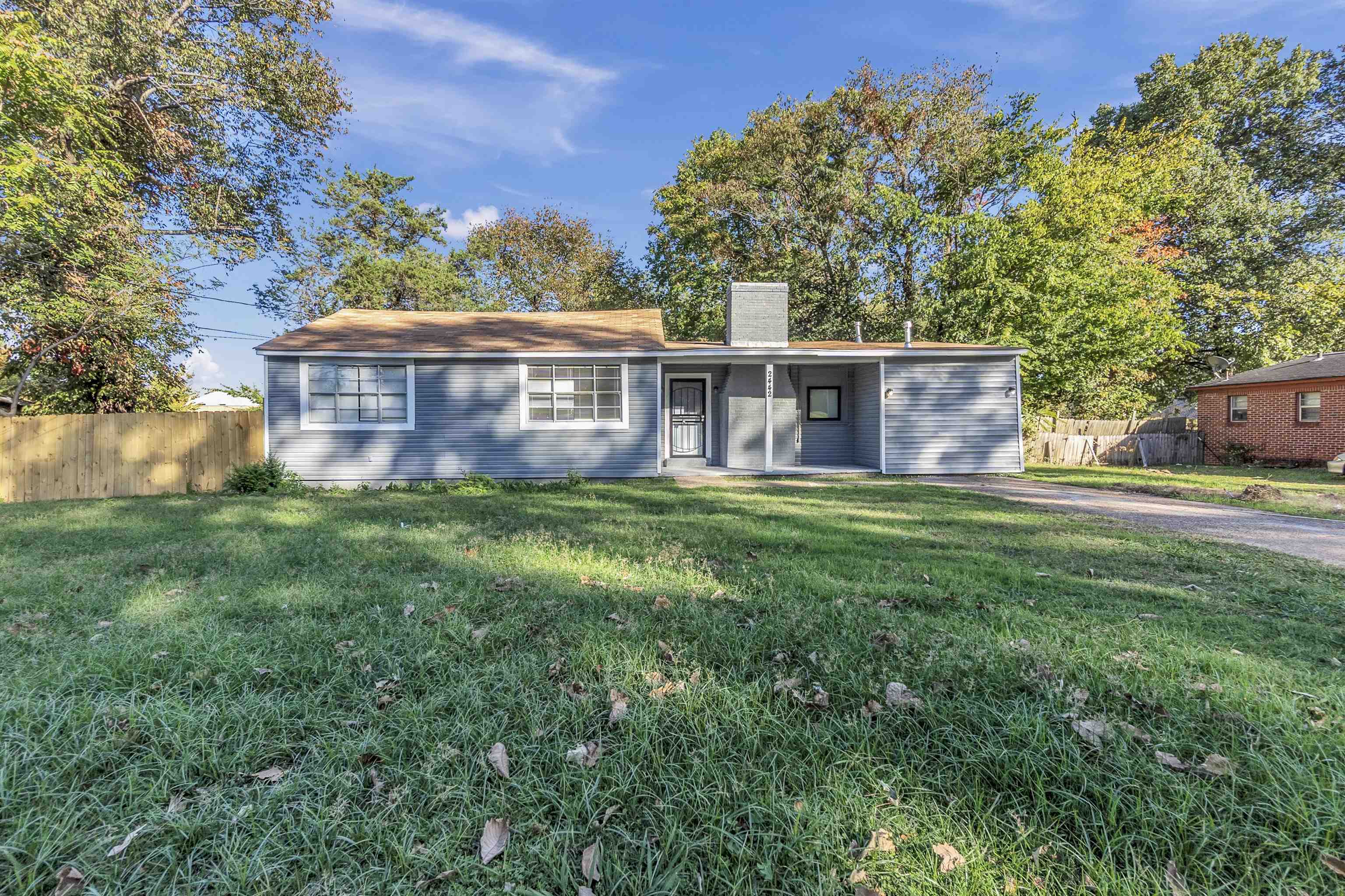 2442 Manchester Road Memphis, TN 38114 - Photo 4 of 22 front view of a house with a yard