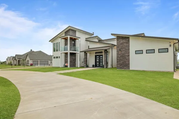 a view of a house with a swimming pool