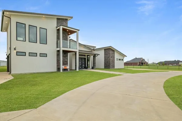 a house view with a garden space