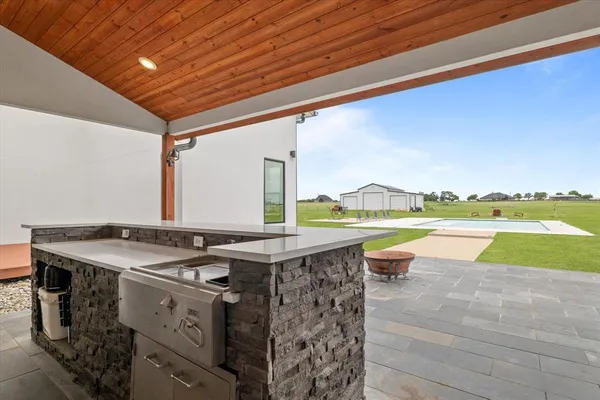 a view of a swimming pool and outdoor space