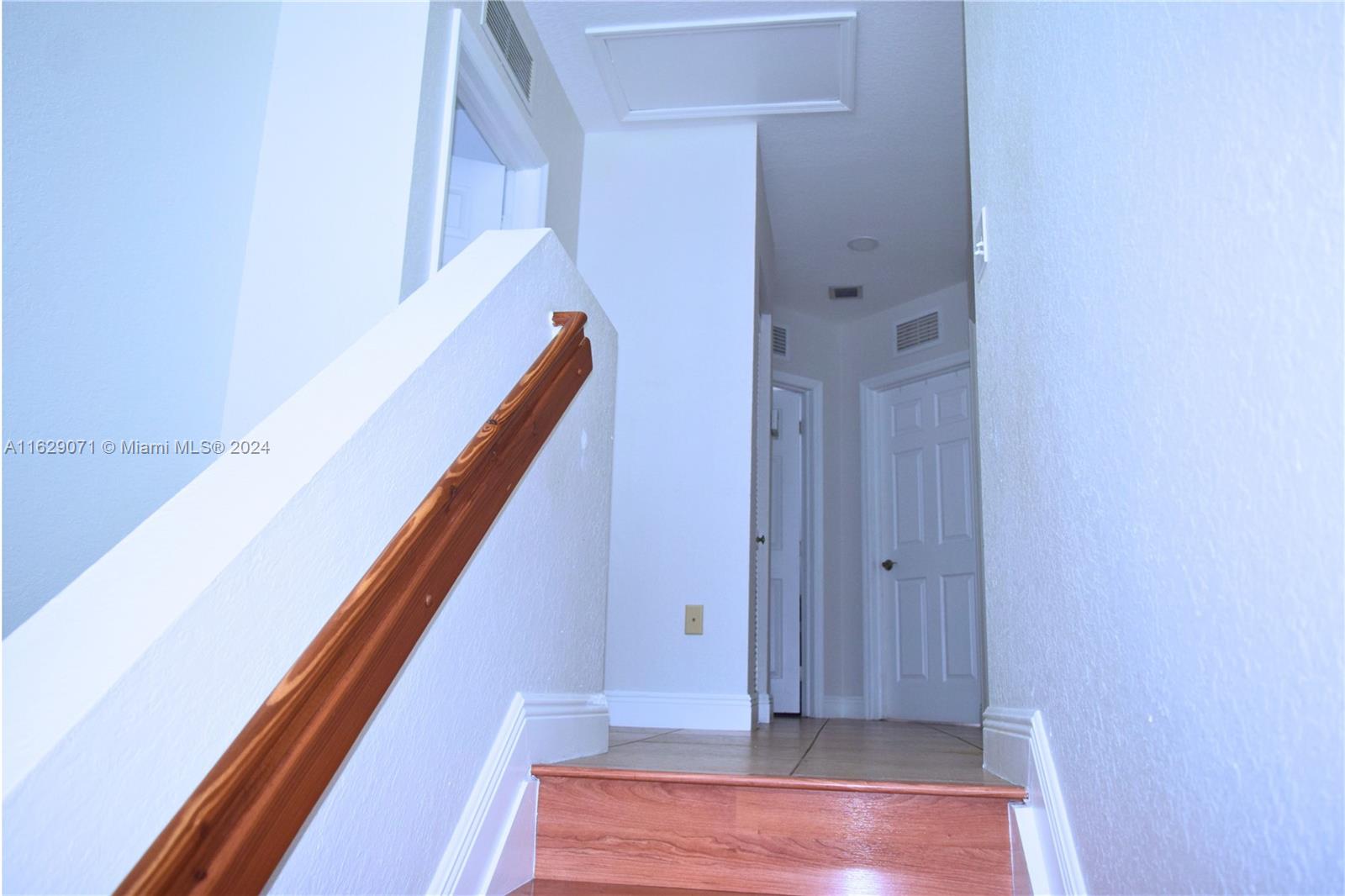 12844 Southwest 256th Terrace Homestead, FL 33032 - Photo 5 of 21 a view of stairs