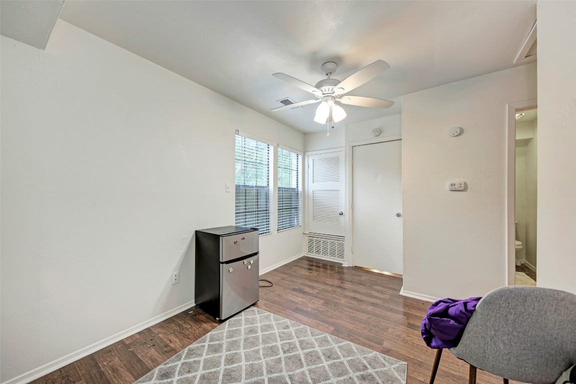 3102 Cedar Street, Unit A Austin, TX 78705 - Photo 17 of 23 a bedroom with bed and window