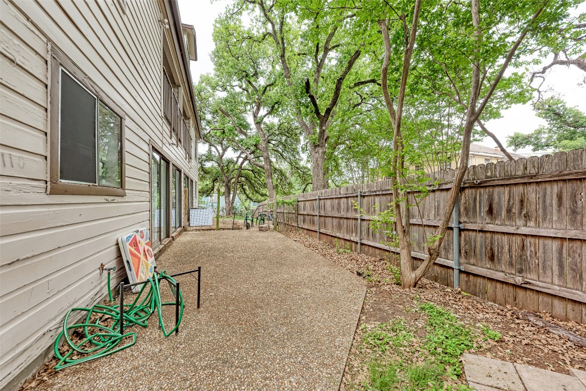 3102 Cedar Street, Unit A Austin, TX 78705 - Photo 22 of 23 a view of a house with backyard and sitting area