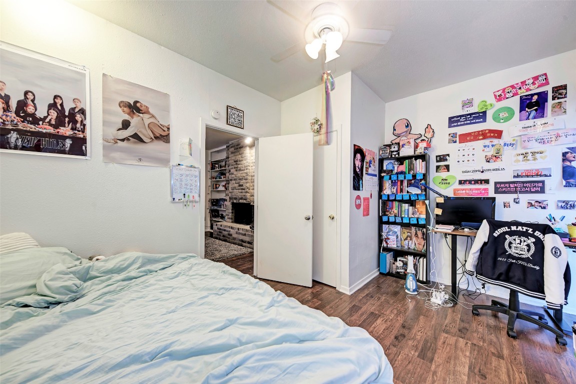 3102 Cedar Street, Unit A Austin, TX 78705 - Photo 8 of 23 a bedroom with a bed and a desk