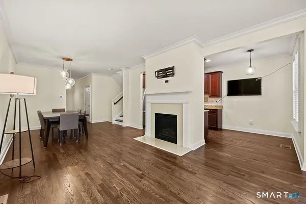 a view of a livingroom with furniture and a fireplace