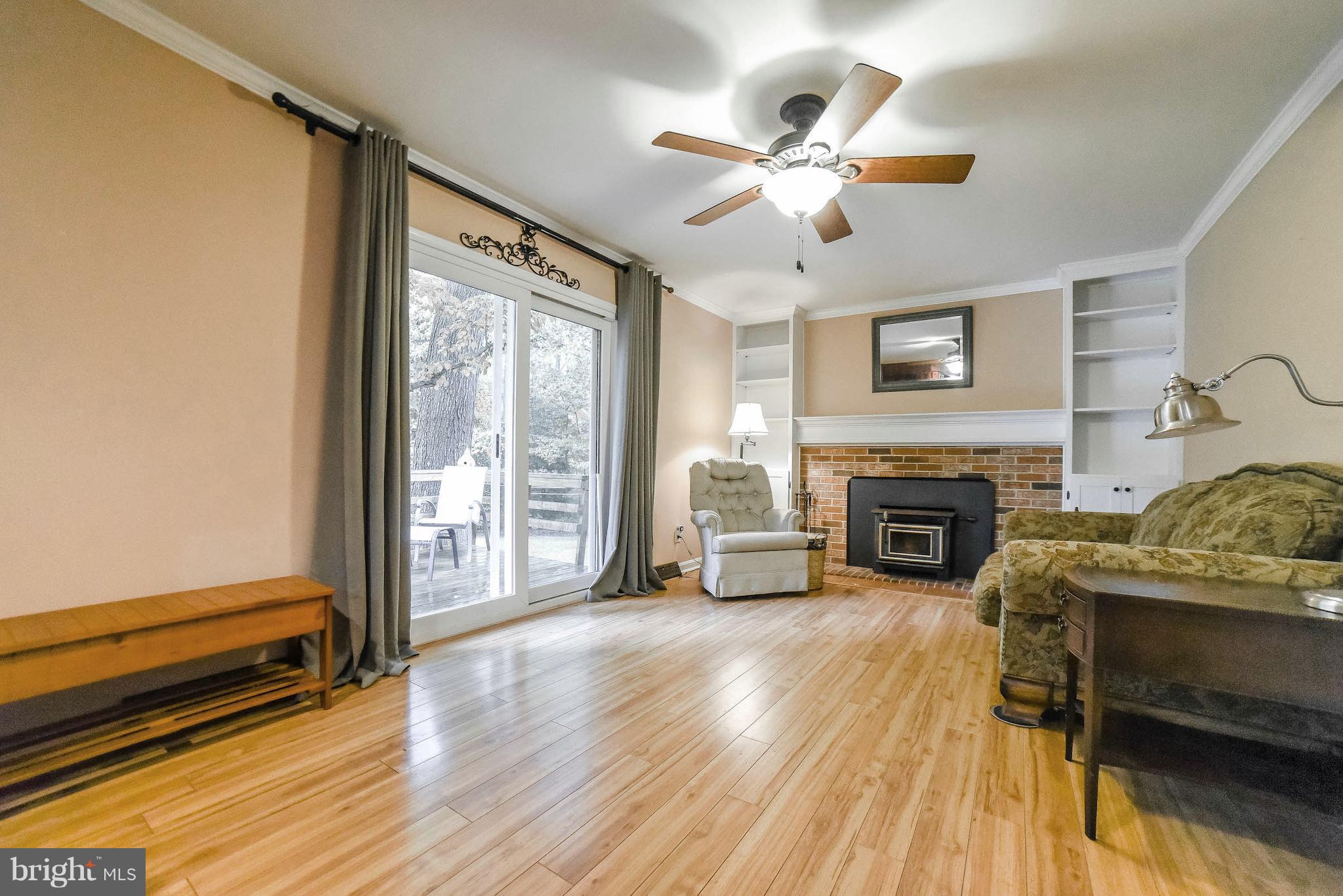 25030 Morgan Road Hollywood, MD 20636 - Photo 6 of 29 Family room with sliding glass door to deck