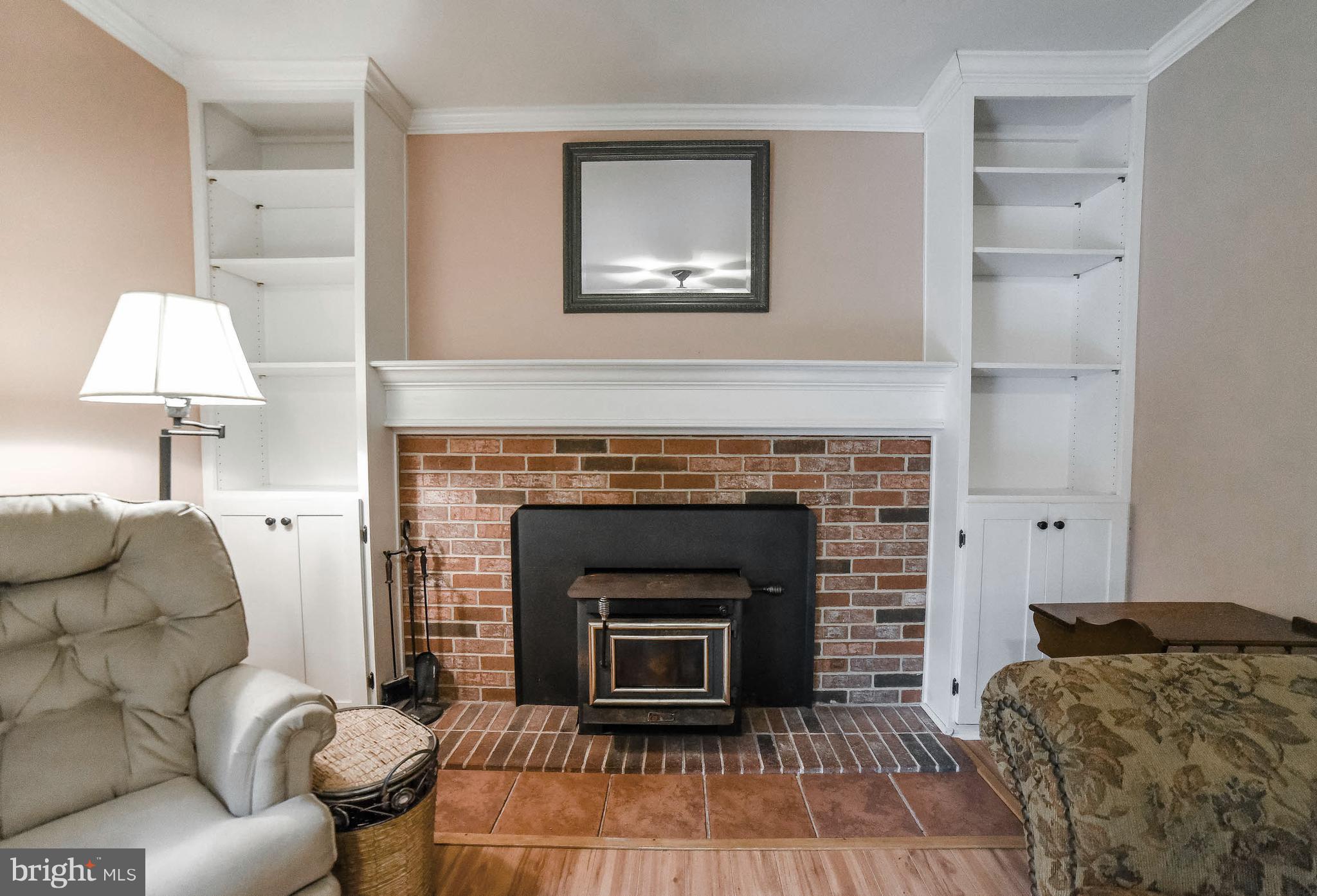 25030 Morgan Road Hollywood, MD 20636 - Photo 9 of 29 Wood stove and nice built-ins for display, storage