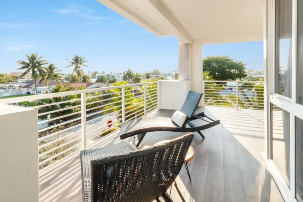 a balcony view with a ocean view