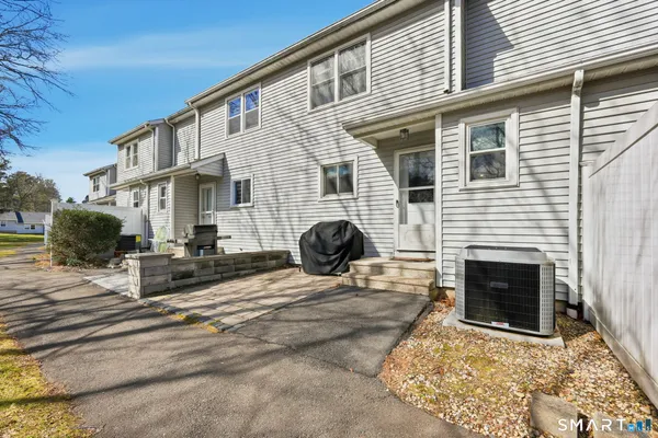 a view of a house with a patio